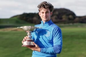 Patrick Curran with the Irish Intervarsity Championship trophy at Kirkistown Castle