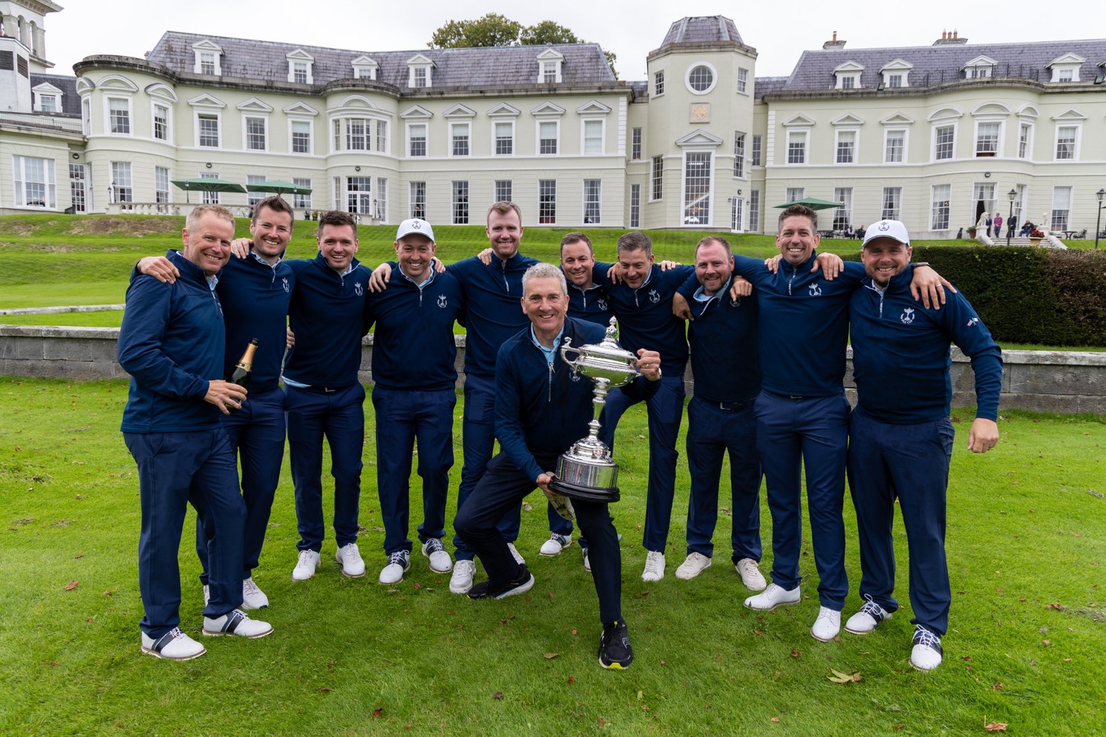 The GB&I team with the PGA Cup trophy outside The K Club