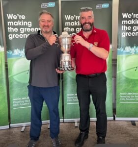Castlebar Golf Club’s Eoin Henshaw and Michael Kilcourse with the HolmPatrick Cup.