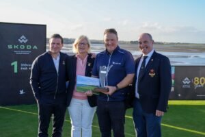 Michael McGeady holding the Sutton 9-Hole Matchplay trophy with Cian Bennis, Jeanne Mahony and Mark Hogan